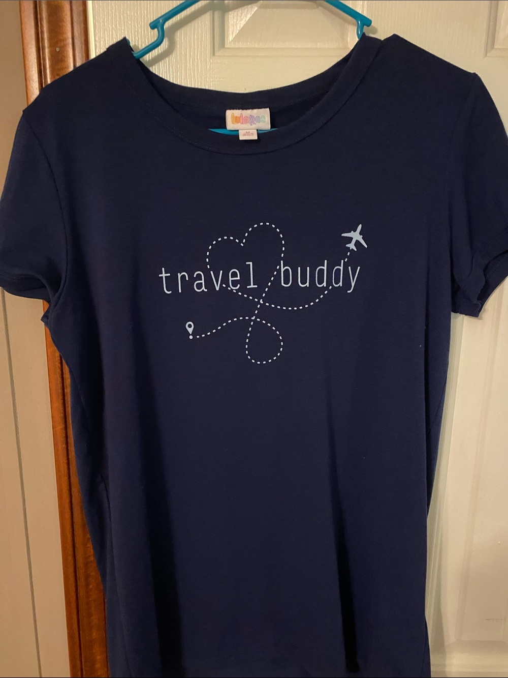 LuLaRoe Navy Tee with Light Blue Travel Buddy Graphic